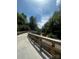 Scenic walking bridge view, surrounded by nature and a gently flowing stream at 405 Wakefield Dr # B, Charlotte, NC 28209