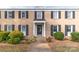 Brick building with a classic design, landscaping, and a welcoming entrance at 405 Wakefield Dr # B, Charlotte, NC 28209