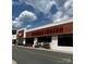 Harris Teeter store front on a sunny day featuring street view and colorful flower arrangements at 405 Wakefield Dr # B, Charlotte, NC 28209