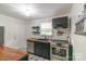 Modern kitchen design with updated appliances, butcher block counters, and stylish flooring at 405 Wakefield Dr # B, Charlotte, NC 28209