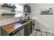 Bright updated kitchen with stainless steel appliances, butcher block countertops, and modern finishes at 405 Wakefield Dr # B, Charlotte, NC 28209
