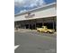 Charming storefront featuring a yellow truck and inviting shopping experience at 405 Wakefield Dr # B, Charlotte, NC 28209