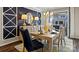 Elegant dining room boasts modern lighting, stylish decor, and a welcoming atmosphere at 5027 Layman Dr # 24, Charlotte, NC 28226