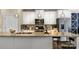 Modern kitchen features stainless steel appliances, granite countertops, and ample cabinet space at 5027 Layman Dr # 24, Charlotte, NC 28226