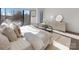 Bright bedroom with a large window and sleek furniture, showcasing modern design and comfortable living space at 819 E 36Th St, Charlotte, NC 28205
