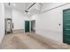 Clean and spacious garage with ample room for parking and storage, featuring a modern design and practical layout at 819 E 36Th St, Charlotte, NC 28205