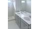 Bathroom featuring double sinks, modern fixtures, and a walk-in shower at 1063 Bull Dog Ln, Wingate, NC 28174