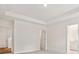 Bright bedroom showcases tray ceilings and neutral carpeting at 1063 Bull Dog Ln, Wingate, NC 28174