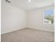 Bedroom with carpet and a single window providing natural light at 1063 Bull Dog Ln, Wingate, NC 28174