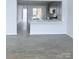 Modern kitchen with a large island, stainless steel appliances, and sleek gray cabinetry at 1063 Bull Dog Ln, Wingate, NC 28174