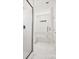 Bright main bathroom with glass enclosed shower and soaking tub at 1063 Bull Dog Ln, Wingate, NC 28174