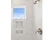 Elegant shower with tiled walls, a window, and built-in shower niches at 1063 Bull Dog Ln, Wingate, NC 28174