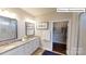 Bathroom with double sinks, granite countertop, and linen closet at 2015 Canvasback Way, Indian Trail, NC 28079
