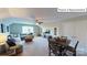 Spacious bonus room featuring a sectional sofa and dining table at 2015 Canvasback Way, Indian Trail, NC 28079