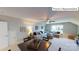 Bright bonus room with sectional sofa and a dining area at 2015 Canvasback Way, Indian Trail, NC 28079
