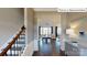 Elegant entryway with hardwood floors and view to the living room at 2015 Canvasback Way, Indian Trail, NC 28079