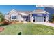 Craftsman style home with stone accents and a welcoming front porch at 2015 Canvasback Way, Indian Trail, NC 28079