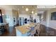 Open concept kitchen with large island and stainless steel appliances at 2015 Canvasback Way, Indian Trail, NC 28079