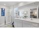 Elegant bathroom with double vanity, large mirror, and shower at 12217 Lady Bell Dr, Charlotte, NC 28278