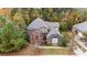 Two story home with gray roof and walkway at 16515 Governors Club Ct, Charlotte, NC 28278