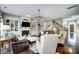 Inviting living room with fireplace, custom built-ins, and plenty of seating for entertaining at 16515 Governors Club Ct, Charlotte, NC 28278