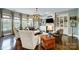 Spacious living room with hardwood floors, fireplace, and stylish furnishings for comfortable living at 16515 Governors Club Ct, Charlotte, NC 28278