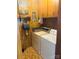 Functional laundry room with washer, dryer, and storage, offering convenience and organization at 116 Lodge Hall Ct, Stony Point, NC 28678