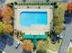Birds eye view of the neighborhood pool with green trees and multiple parking spots at 1305 Penny Oaks Cv, Rock Hill, SC 29732