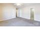 Large bedroom featuring neutral carpet, multiple closets, and an en-suite bathroom at 1305 Penny Oaks Cv, Rock Hill, SC 29732
