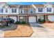 Charming townhouse with attached garage, well-maintained landscaping, and inviting curb appeal at 1305 Penny Oaks Cv, Rock Hill, SC 29732