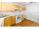 Functional kitchen with white appliances, plenty of cabinet space, and hardwood floors at 1305 Penny Oaks Cv, Rock Hill, SC 29732