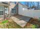 Exterior shot of the patio with white vinyl fence and the siding of the townhome at 1305 Penny Oaks Cv, Rock Hill, SC 29732