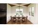 Dining room featuring a decorative chandelier and plenty of natural light with seating for eight at 229A Ballard Ct, Fort Mill, SC 29715