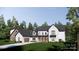 Charming two-story modern farmhouse with mixed siding and a welcoming front yard at 229A Ballard Ct, Fort Mill, SC 29715