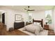 Inviting bedroom with plenty of natural light and hardwood floors at 229A Ballard Ct, Fort Mill, SC 29715
