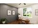 Comfortable home office space with a large window and decorative wall paneling at 229A Ballard Ct, Fort Mill, SC 29715