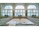 Beautiful bathroom with a large tub and arched windows allowing natural light at 3513 Country Club Dr, Gastonia, NC 28056
