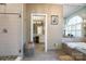 Bright bathroom with a glass-enclosed shower and a separate tub area at 3513 Country Club Dr, Gastonia, NC 28056