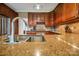 Kitchen featuring granite countertops, stainless steel appliances, and custom cabinetry at 3513 Country Club Dr, Gastonia, NC 28056