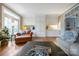 Cozy living room with built-in cabinets and a warm, inviting atmosphere at 3513 Country Club Dr, Gastonia, NC 28056