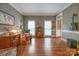 Spacious living room boasting natural light, hardwood floors and elegant trim work at 3513 Country Club Dr, Gastonia, NC 28056