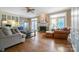 Inviting living room with a fireplace, hardwood floors and comfortable seating at 3513 Country Club Dr, Gastonia, NC 28056