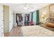 Spacious bedroom features a walk-in closet, and large window with natural lighting at 5300 Fair Wind Ln, Charlotte, NC 28212