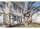 Two-story home with green shutters and ample natural light at 5300 Fair Wind Ln, Charlotte, NC 28212