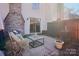 Outdoor patio with wood fence, patio furniture, and sliding glass doors at 5300 Fair Wind Ln, Charlotte, NC 28212