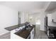Modern kitchen with granite countertops and a stainless steel sink at 6534 Providence Rd, Charlotte, NC 28226