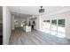Spacious living area with lots of windows, modern kitchen with island at 6534 Providence Rd, Charlotte, NC 28226