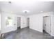 Large, open room with recessed lighting, concrete floor, and multiple doorways offers versatile space at 6534 Providence Rd, Charlotte, NC 28226