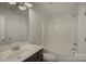 Simple bathroom featuring a single vanity and shower tub combo at 10029 Daufuskie Dr, Charlotte, NC 28278