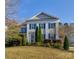 Two story home with gray siding and blue shutters at 10029 Daufuskie Dr, Charlotte, NC 28278